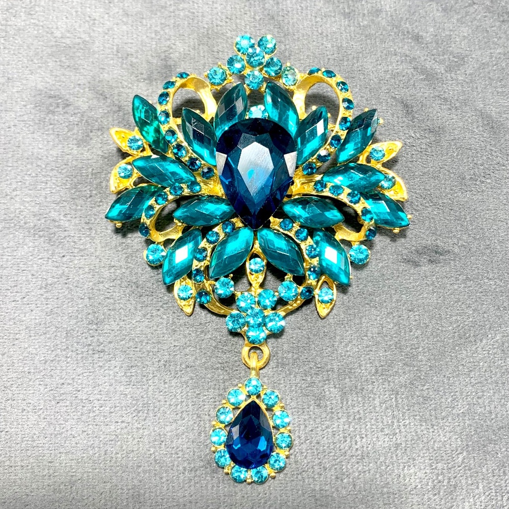 Large floral tear drop statement brooch blue/green rhinestones gold-tone royal